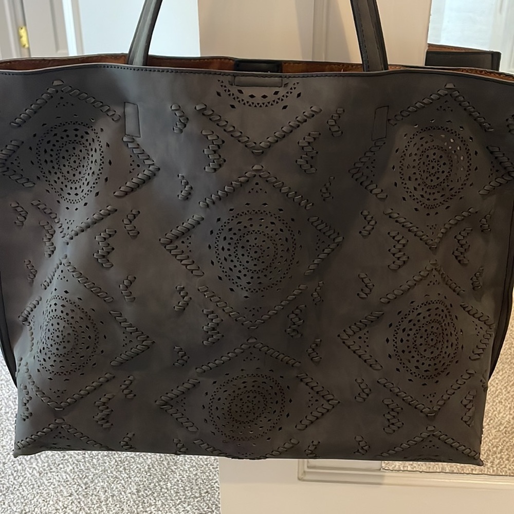 Black and brown tote. Great condition